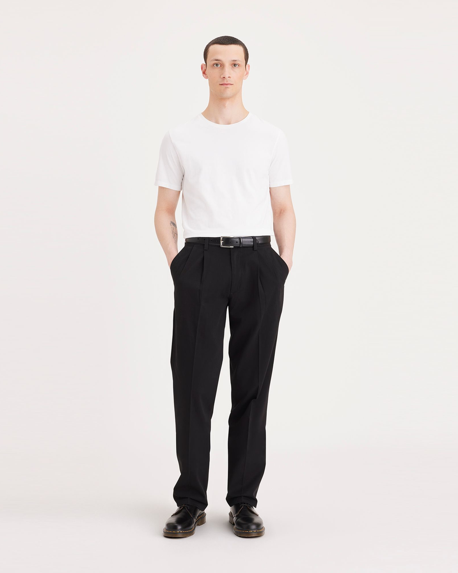 Front view of model wearing Black Easy Khakis, Pleated, Classic Fit.