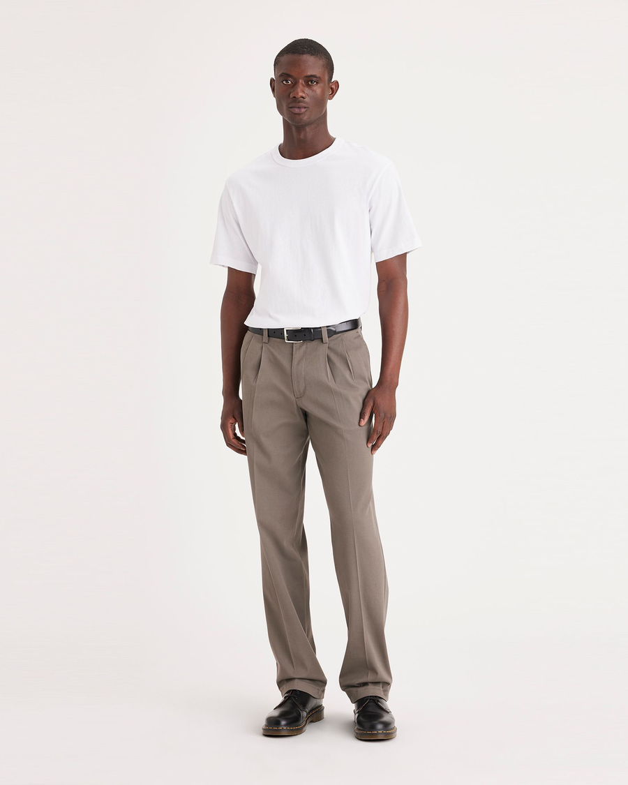 Front view of model wearing Dark Pebble Easy Khakis, Pleated, Classic Fit.