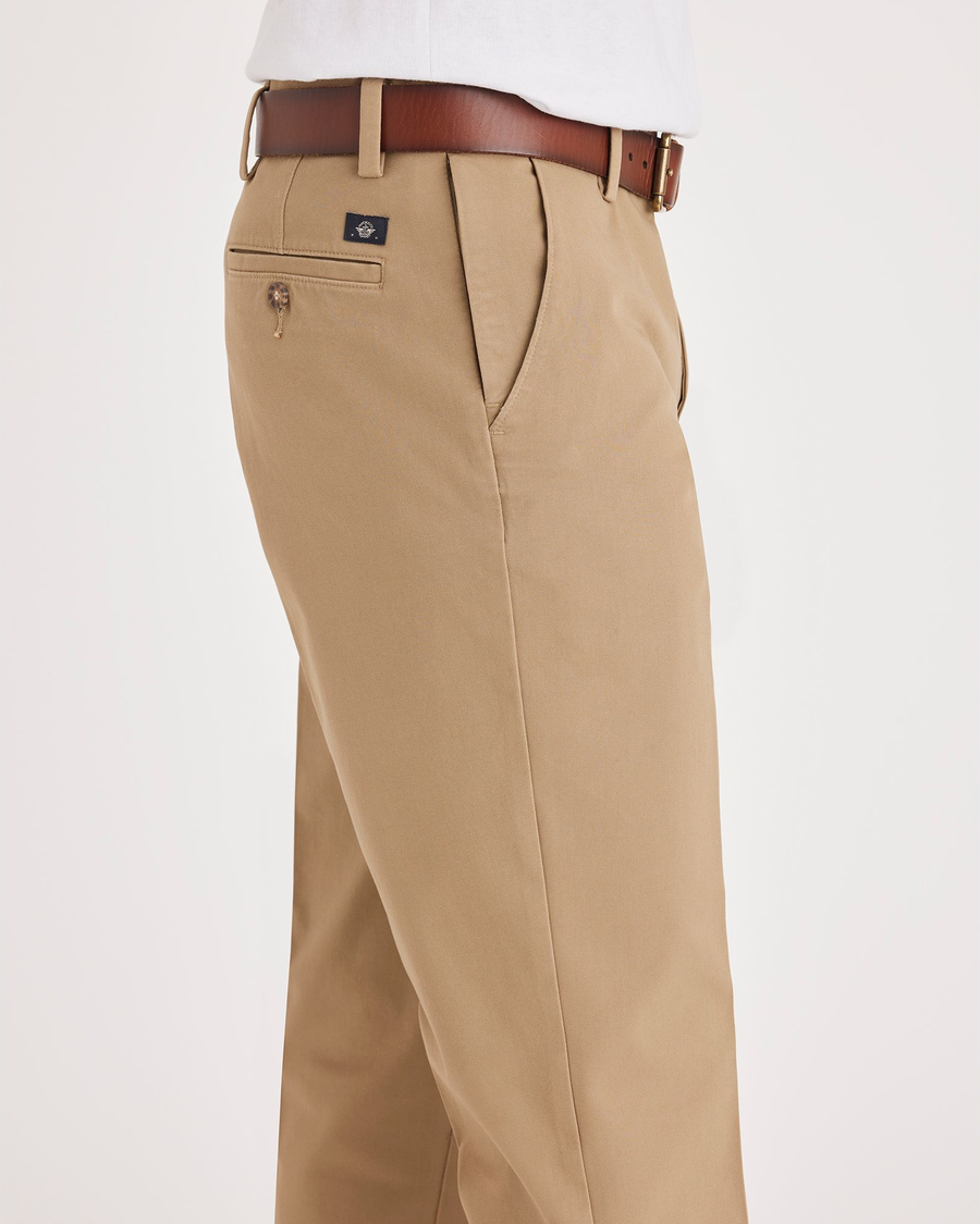 Side view of model wearing New British Khaki Workday Khakis, Straight Fit.