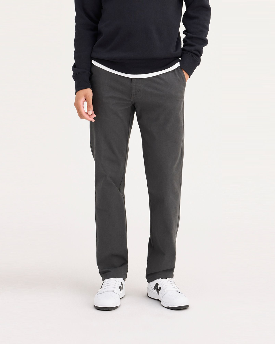 Front view of model wearing Steelhead Ultimate Chinos, Slim Fit.